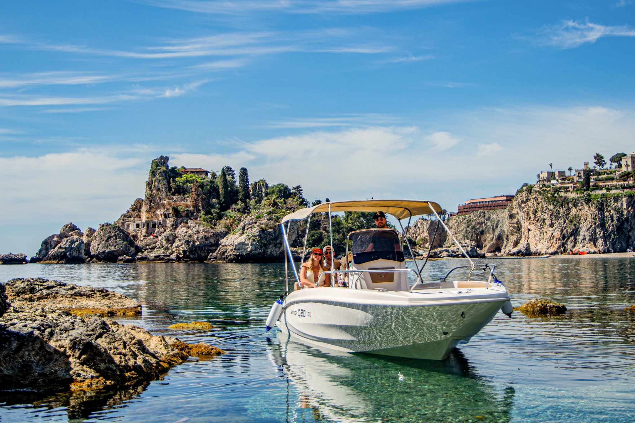 The Barqa Q20 with its shaded seating beside Isola Bella